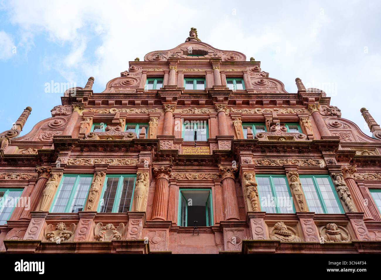 Heidelberg, Germany - June 8, 2025: Close-up view of the intricate facade of the House of the Knight St. George featuring decorative sculptures and vi Stock Photo
