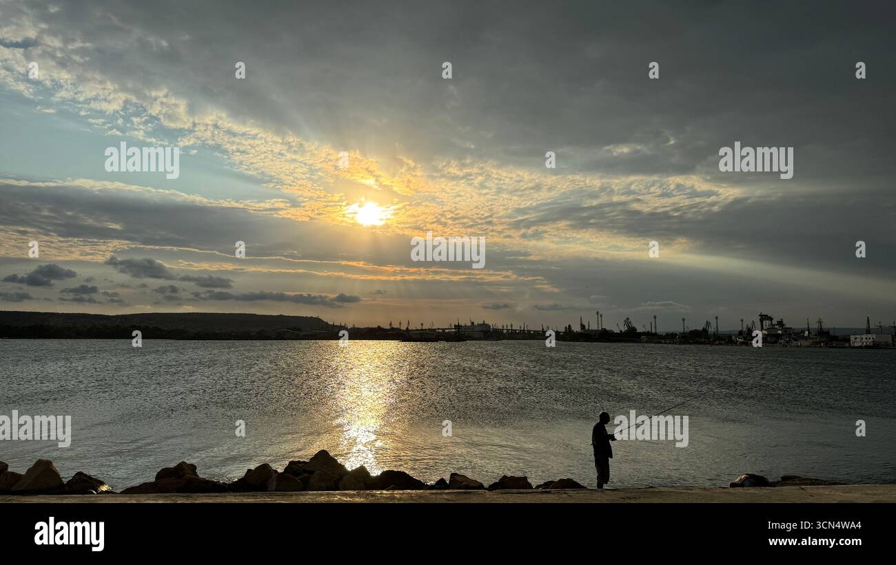 A fisherman sea and sunset 10.09.2025 Varna Bulgaria - Smartphone Captured Stock Image