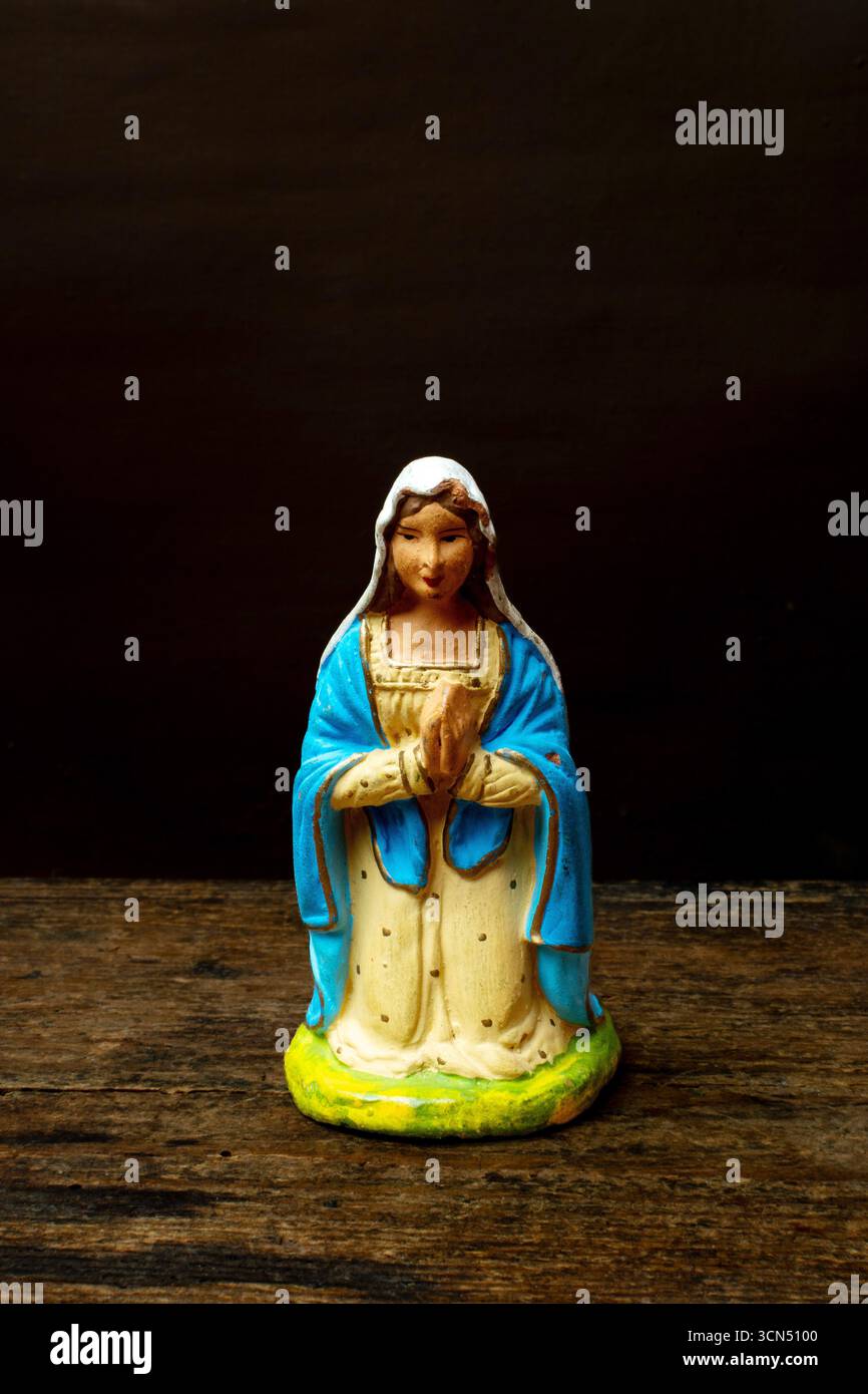 Coloured terracotta santon figurine (Virgin Mary) Provence, France Stock Photo