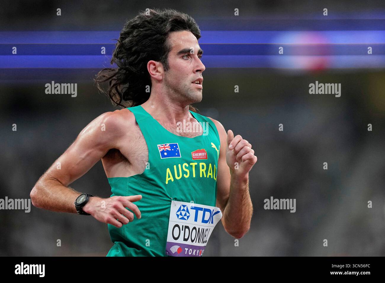 Australia's Seth O'Donnell races in a men's 5,000 meters heat at the