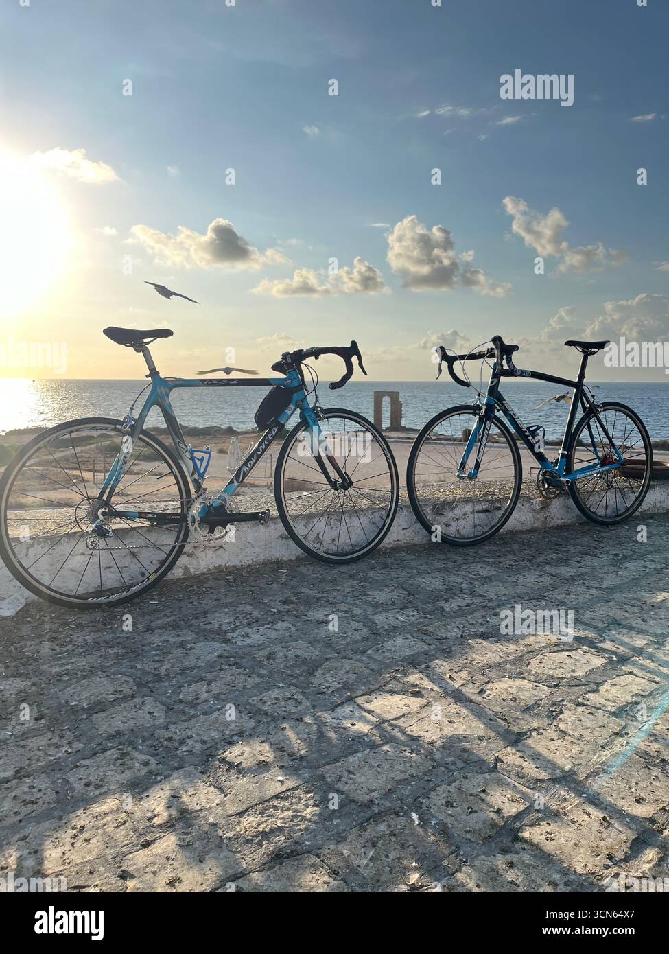 “Bicycles parked near the historic Borj Ras fortress in Mahdia, Tunisia, Mediterranean coast” - Smartphone Captured Stock Image