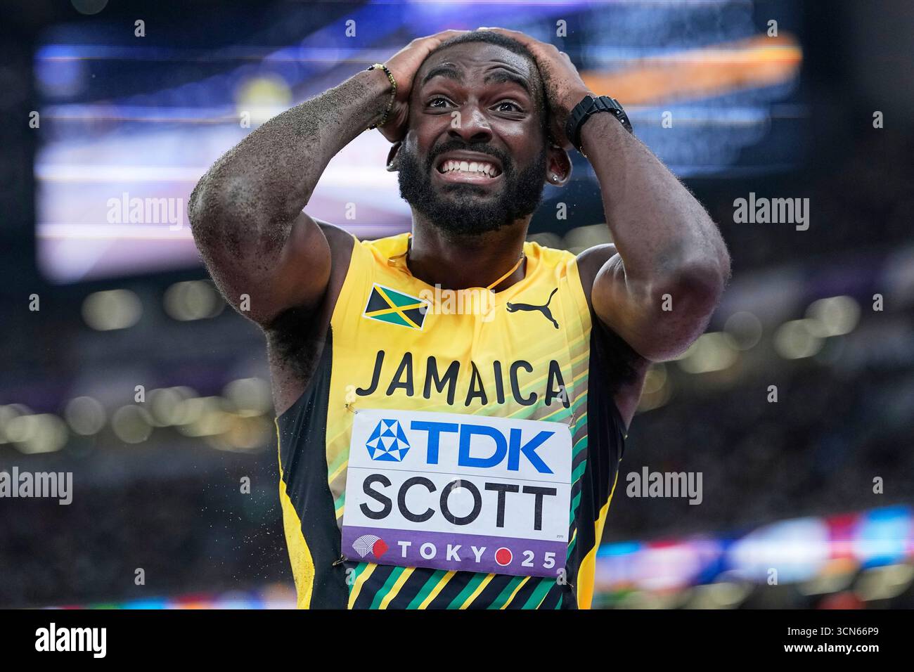 Jamaica's Jordan Scott reacts in the men's triple jump final at the ...