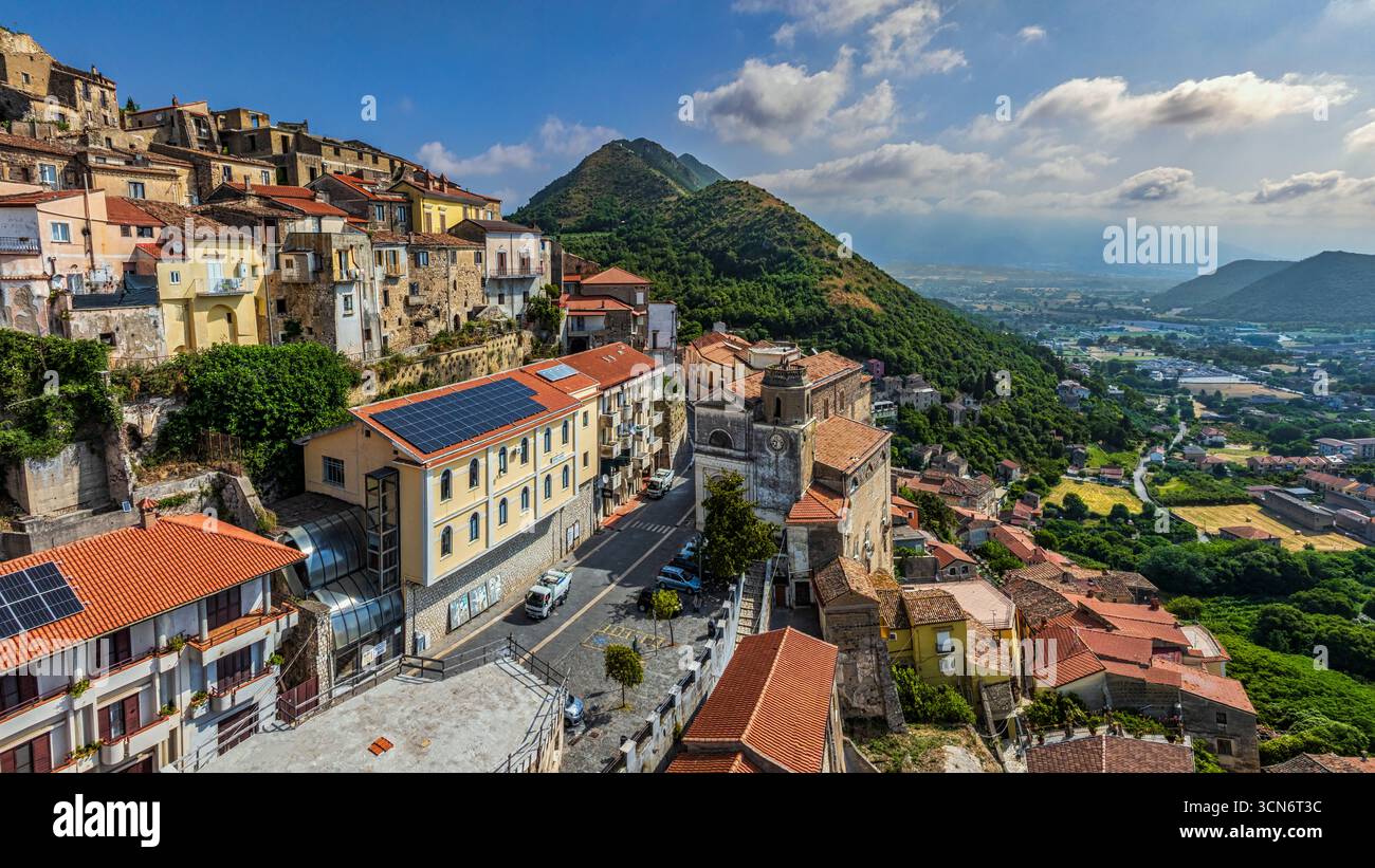 Aerial view of the ancient medieval village, with Mount San Nicola and the temple-theatre in the background. Pietravairano, Campania Stock Photo