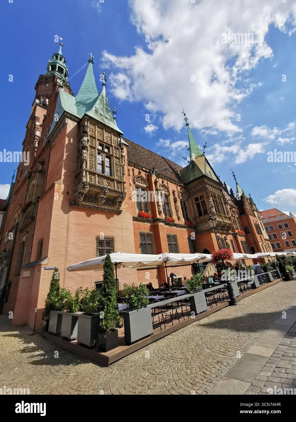Wrocław Town Hall: Gothic masterpiece in Rynek Market Square, Poland. History, architecture, and iconic astronomical clock. - Smartphone Captured Stock Image