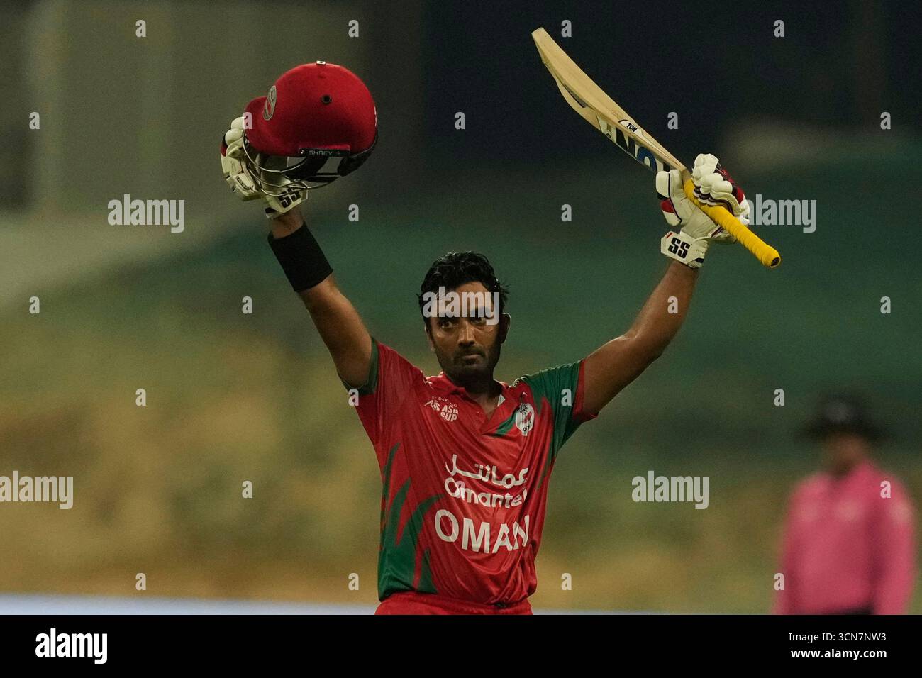Oman's Aamir Kaleem celebrates after scoring fifty runs during the Asia ...
