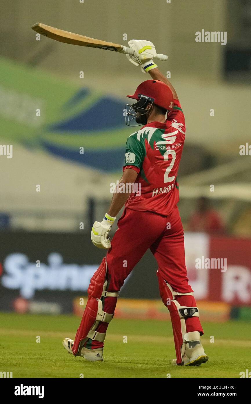 Oman's Hammad Mirza celebrates after scoring fifty runs during the Asia ...