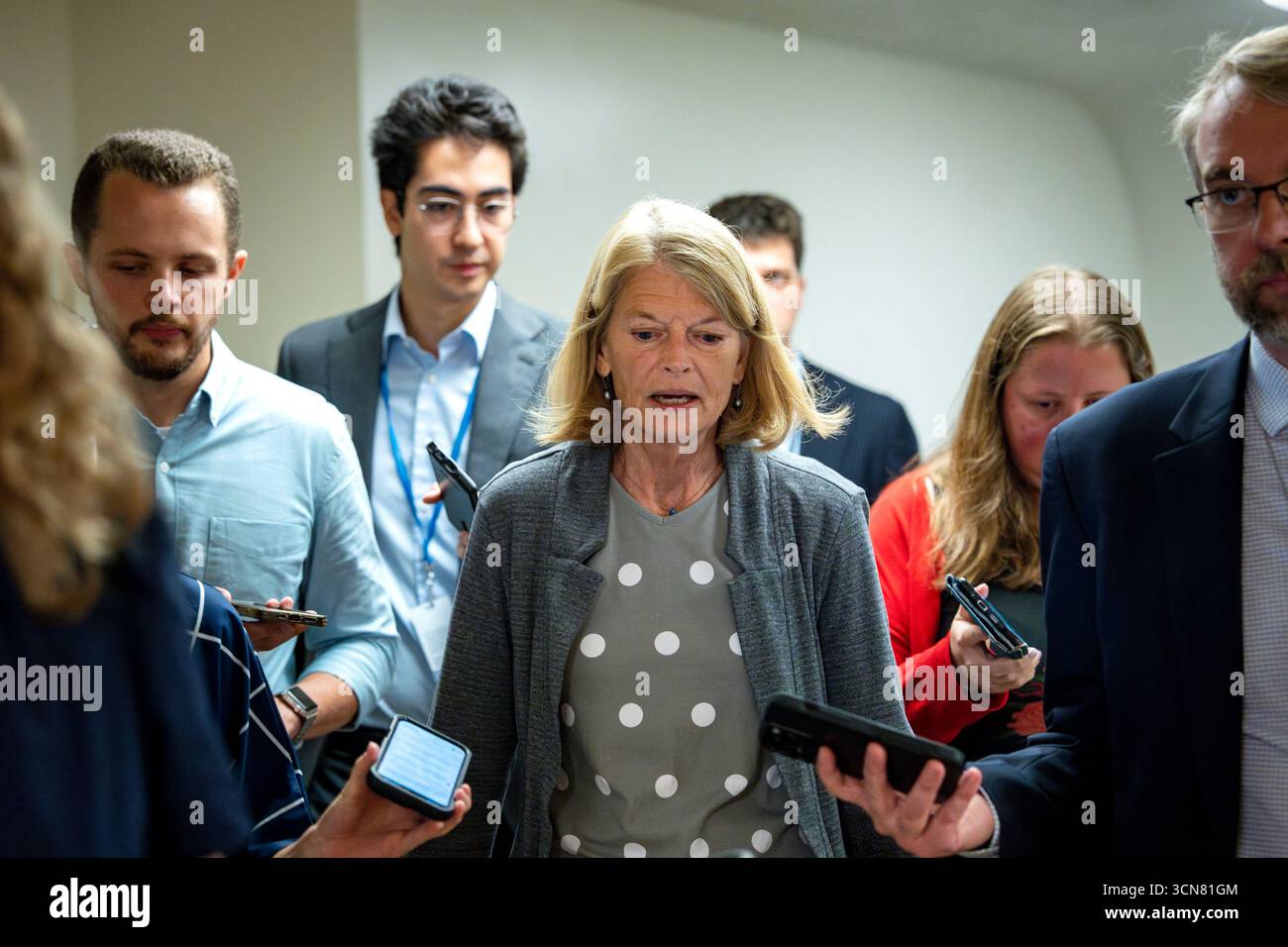 Sen. Lisa Murkowski, R-AK, speaks with reporters while walking to the Senate chamber to vote on the House stopgap bill and Democrat alternative with healthcare provisions at the U.S. Capitol in Washington, DC on Friday, September 19, 2025. Murkowski and Sen. Rand Paul, R-KY, were the only two republicans to vote against the House stopgap bill that would avert a government shutdown.The Senate will return on September 29, a day before the shutdown, to attempt to come to a resolution to avert a partial government shutdown. Photo by Bonnie Cash/UPI Stock Photo
