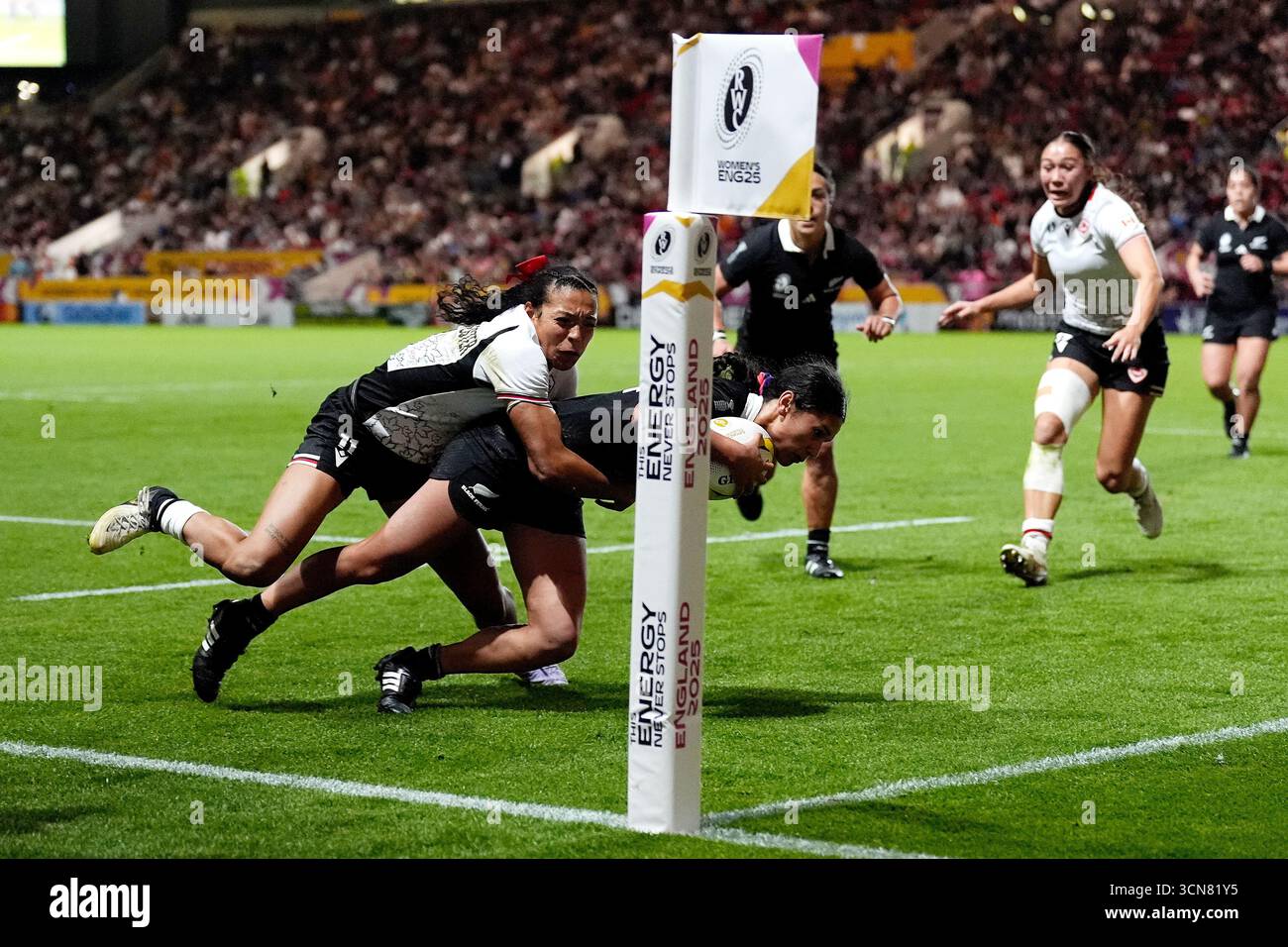 New Zealand's Braxton Sorensen-Mcgee (centre) scores a try during the ...