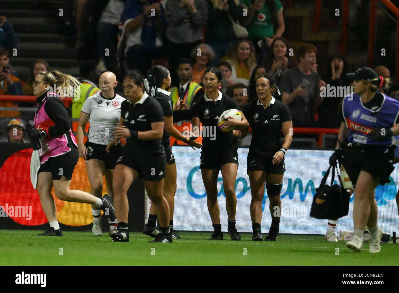New Zealand's Braxton Sorensen-McGee, centre, celebrates after scoring ...