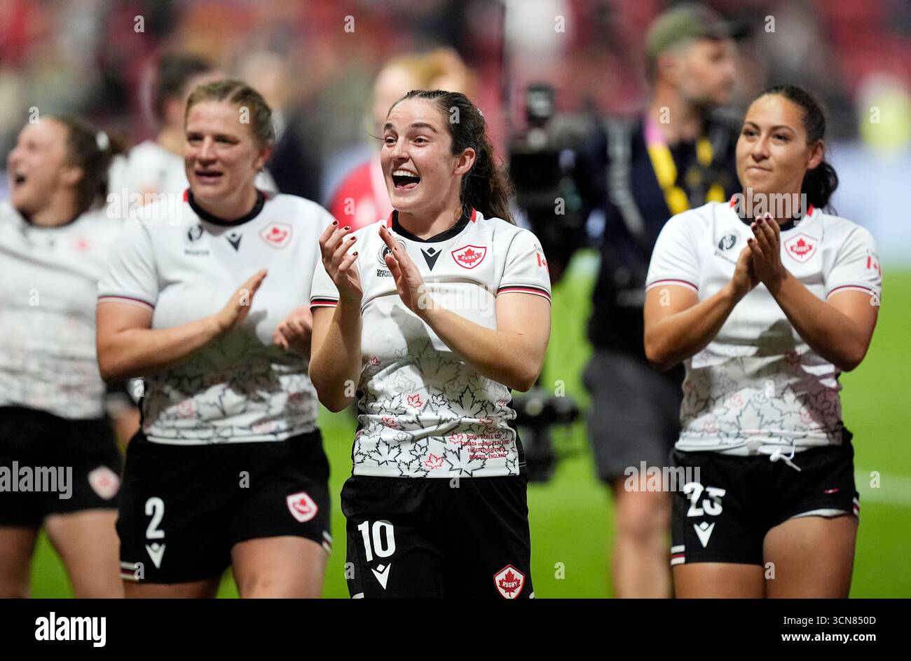 Canada's Taylor Perry (centre), Emily Tuttosi, (left) and Shoshanah ...
