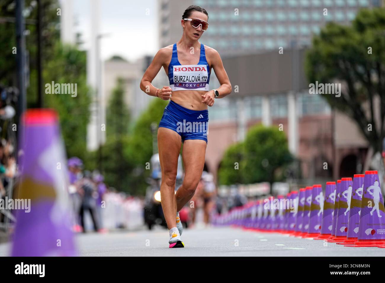 Slovakia's Hana Burzalova races in the women's 20 kilometers race walk ...