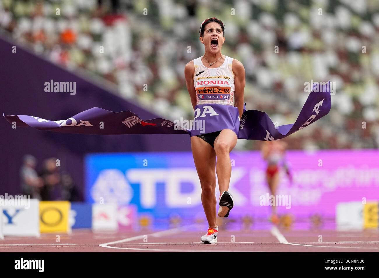 Spain's Maria Perez celebrates after winning the gold medal in the ...
