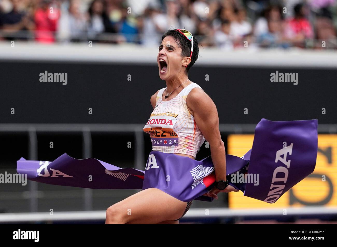 Spain's Maria Perez crosses the finish line to win the women's 20 ...