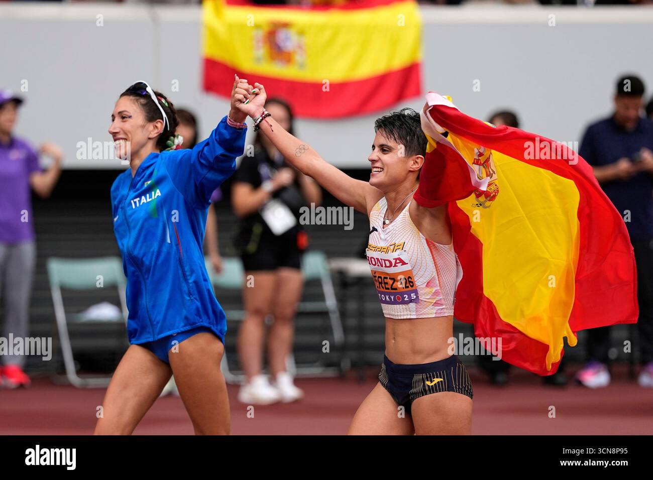 Spain's Maria Perez celebrates with Italy's Antonella Palmisano, left ...