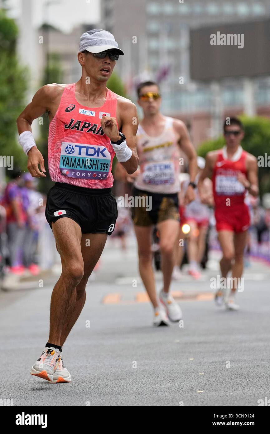 Japan's Toshikazu Yamanishi leads the men's 20 kilometers race walk at ...