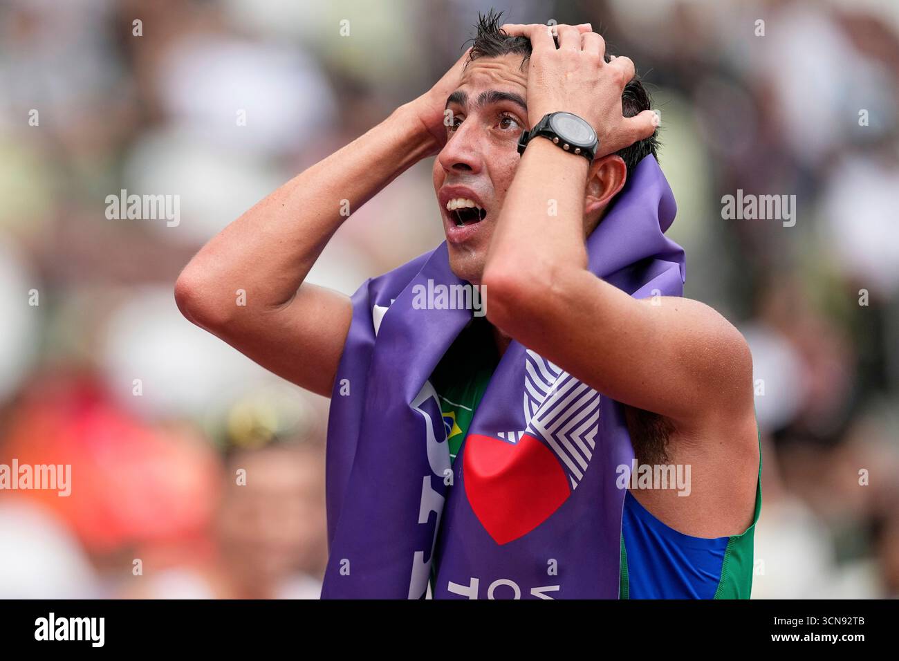 Brazil's Caio Bonfim reacts after winning the men's 20 kilometers race ...