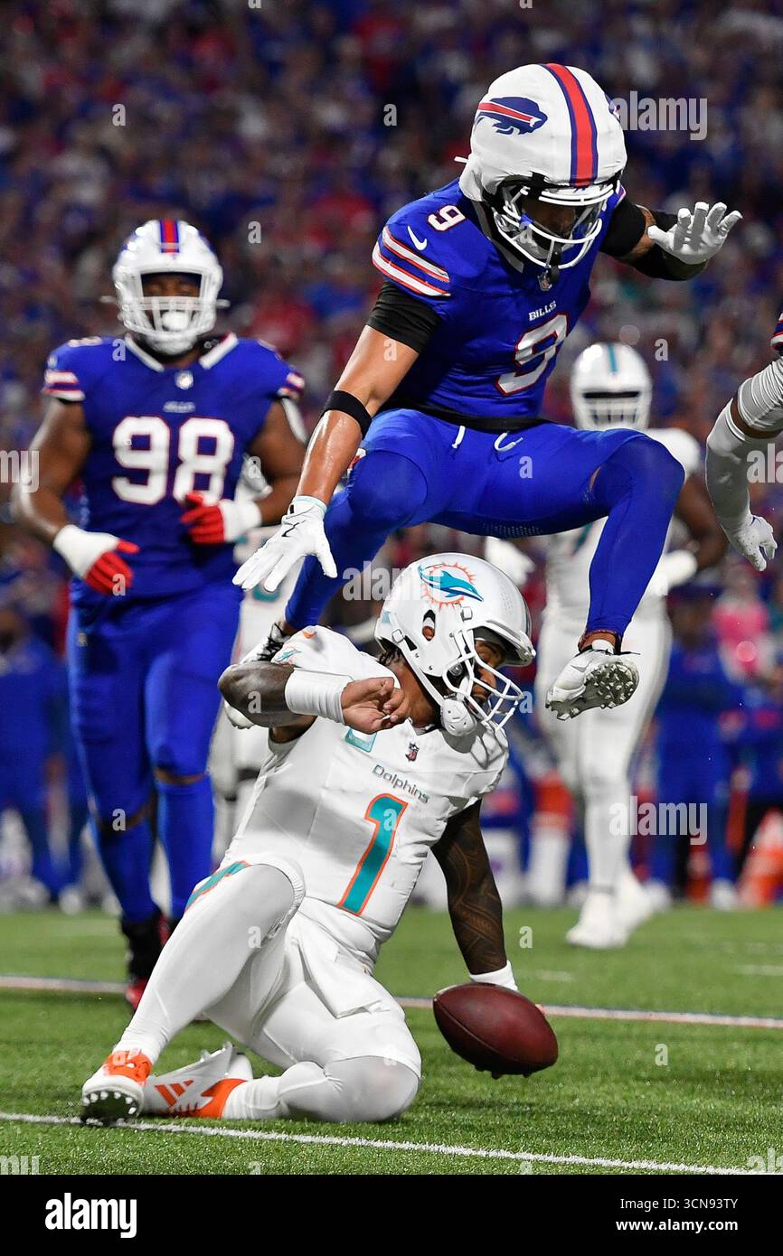 Miami Dolphins quarterback Tua Tagovailoa (1) slides as Buffalo Bills ...