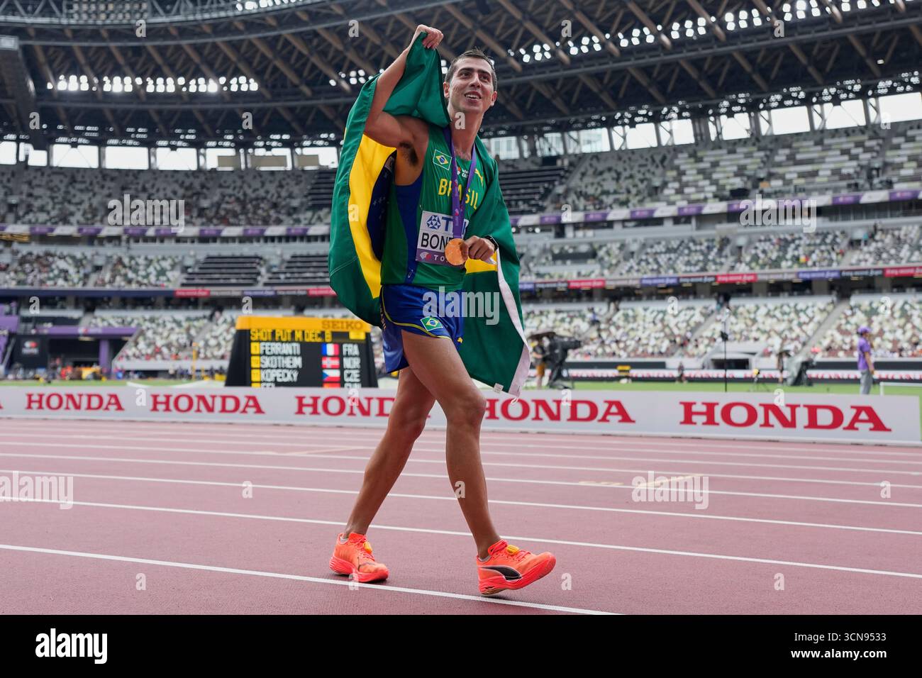 Brazil's Caio Bonfim reacts after winning the men's 20 kilometers race ...
