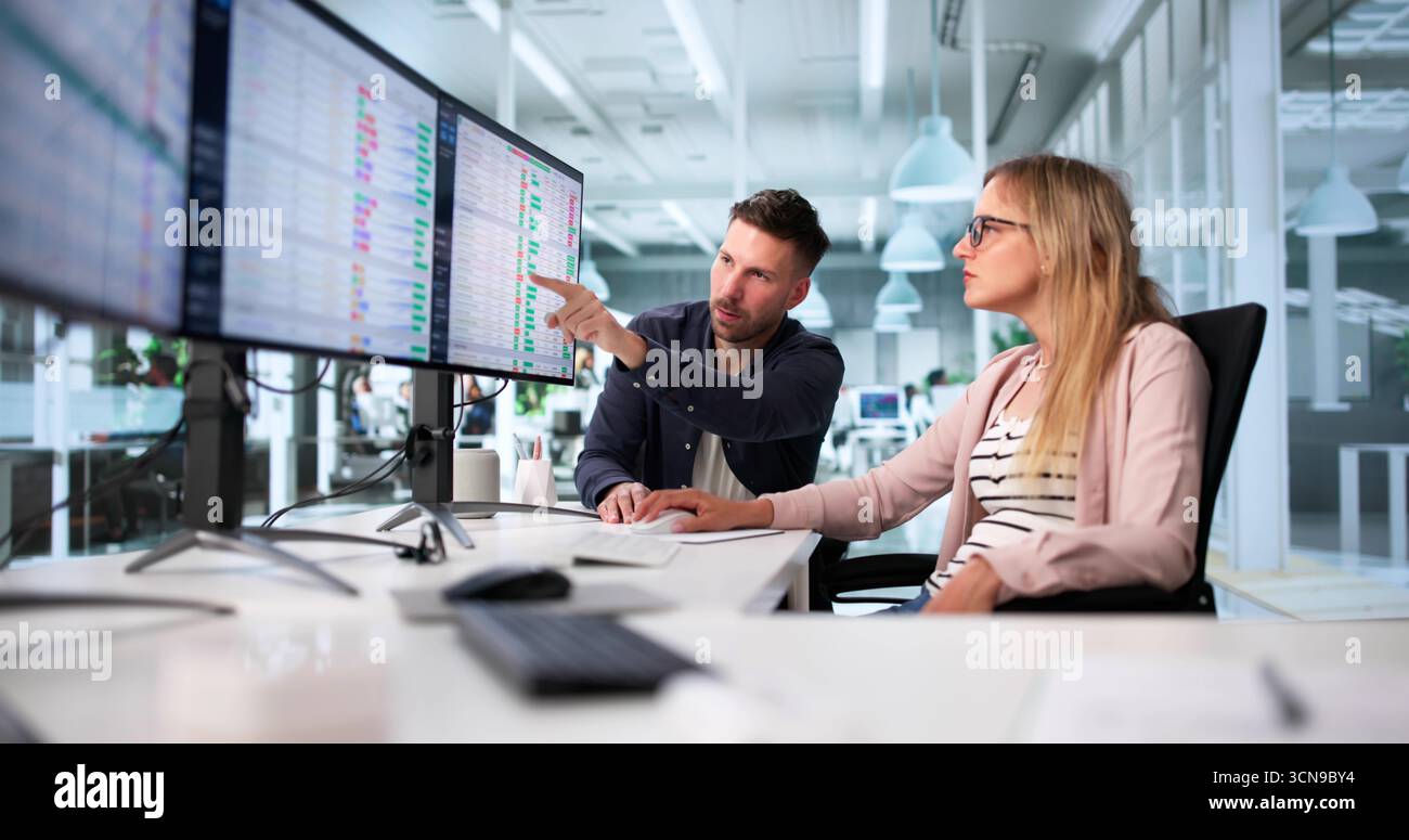 Manager Reviewing Medical Billing Audit Using Computer For Accounting Reports. Stock Photo