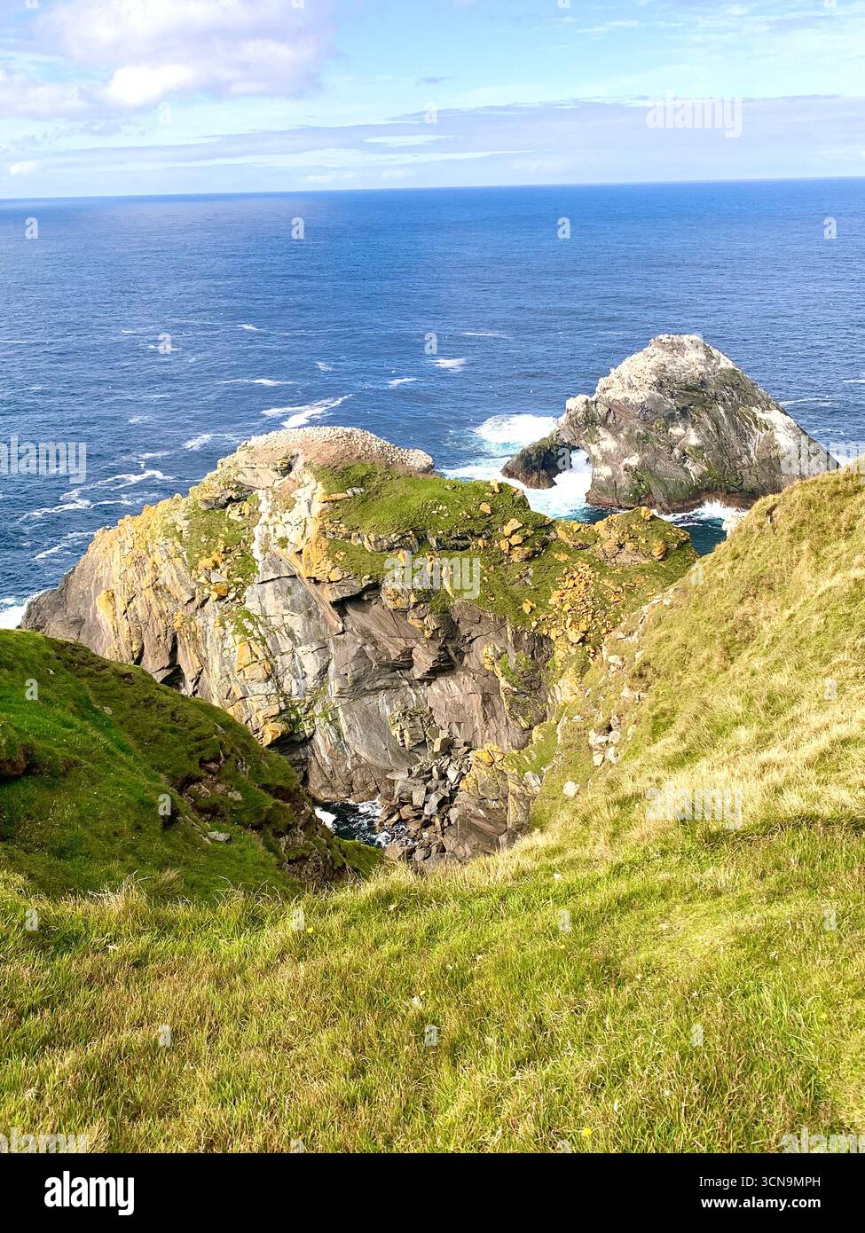 Shetland islands airport runway plane landing Lerwick  tail road hills road sign lamb sheep water sea heather shore mountains mountain path people - Smartphone Captured Stock Image