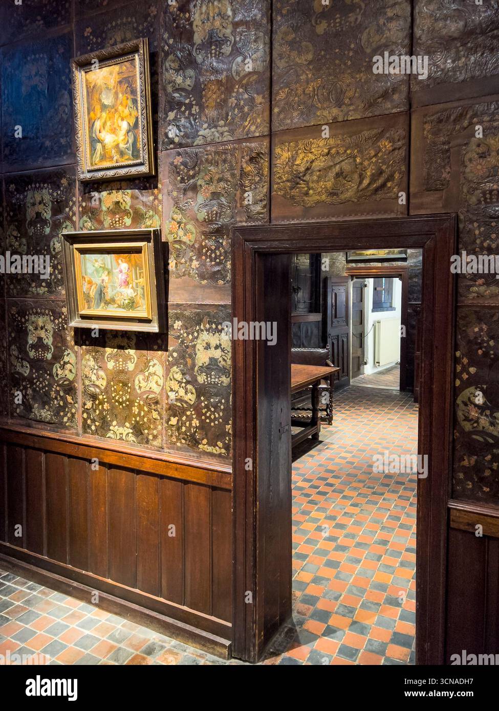 Embossed and gilded 16c leather wall hangings in the Plantin-Moretus Museum, once the home of the famous Plantin printing dynasty (Antwerp, Belgium) Stock Photo
