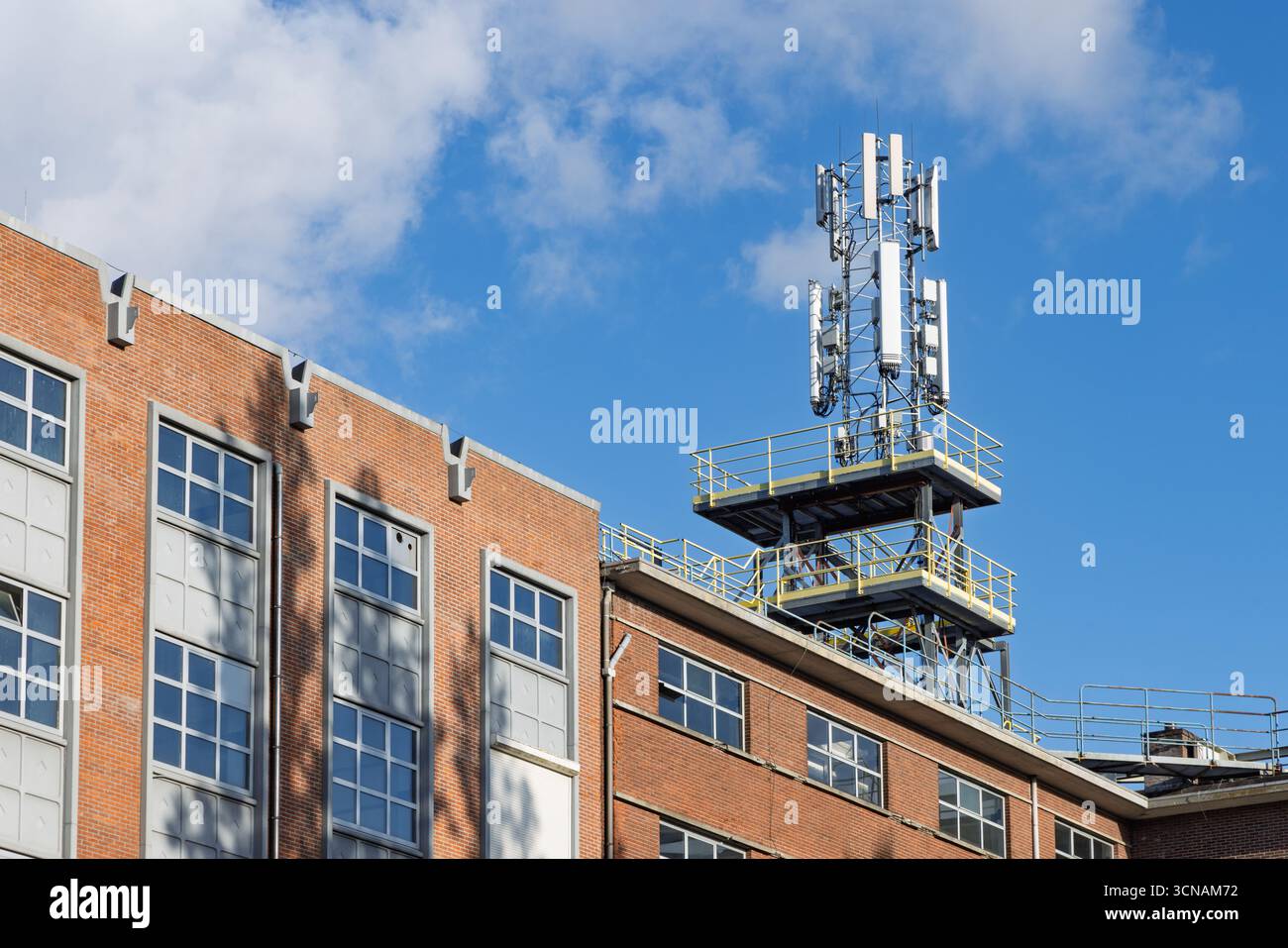 Telecommunication tower antennas against bright hi-res stock ...