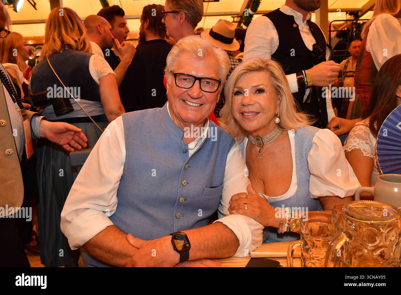 Michael Hartl and Marianne Hartl pose during the opening of the Oktoberfest 2025 at Schottenhamel tent on September 20, 2025 in Munich, Germany. Stock Photo