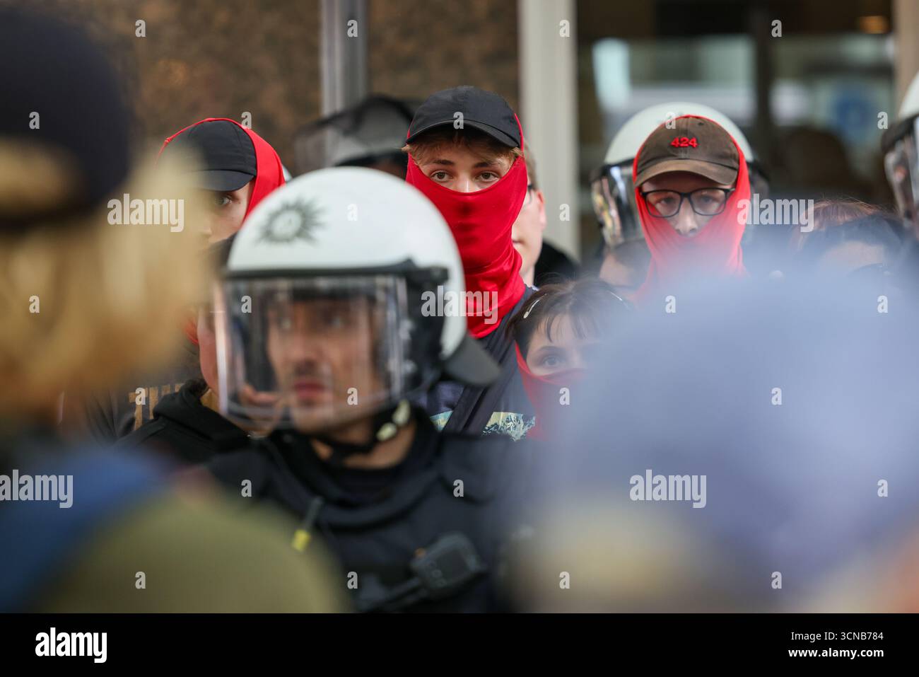 20 September 2025, North Rhine-Westphalia, Cologne: A group of counter ...