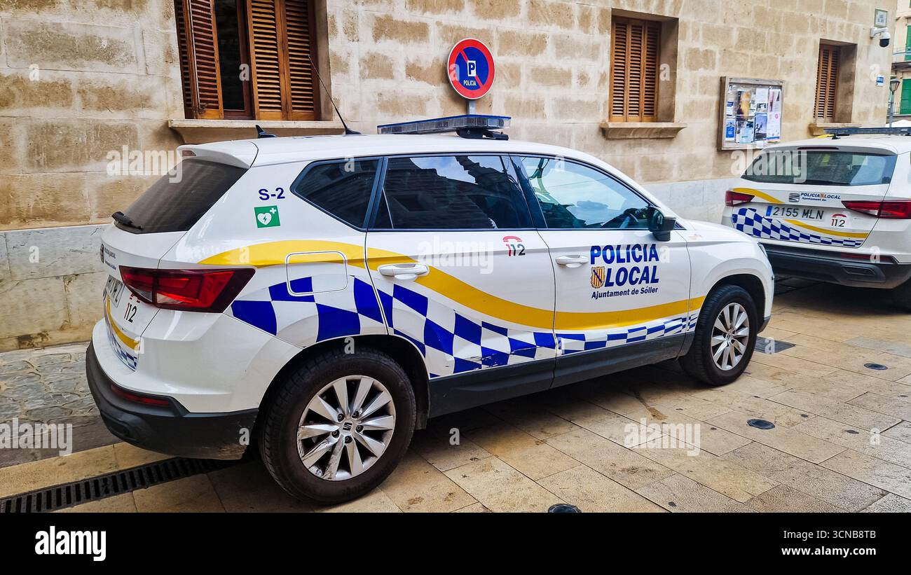 Soller, Spain - September 6 2025: Spanish Police car on Soller Mallorca city street. - Smartphone Captured Stock Image