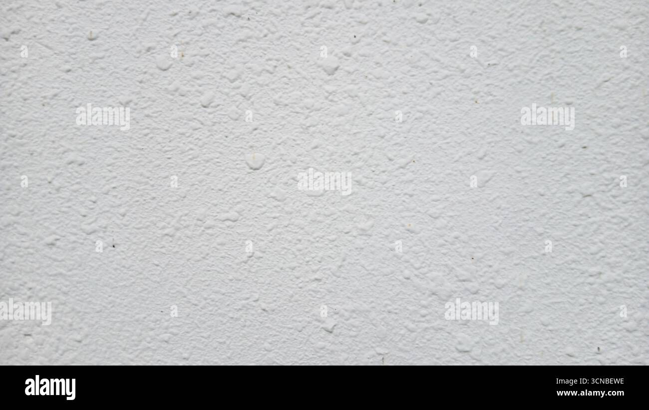 Textured white wall background with subtle grunge and copy space Stock Photo
