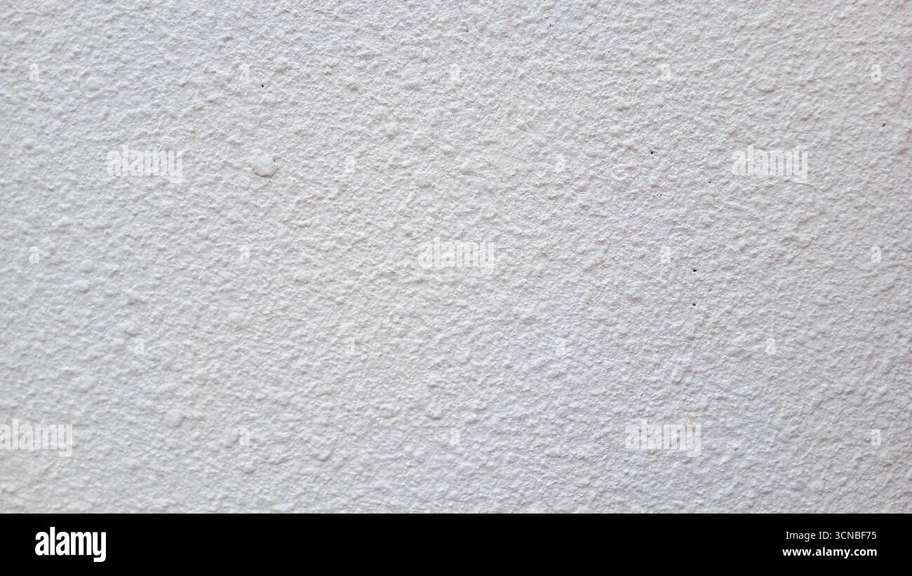 Textured white wall background with subtle grunge and copy space Stock Photo