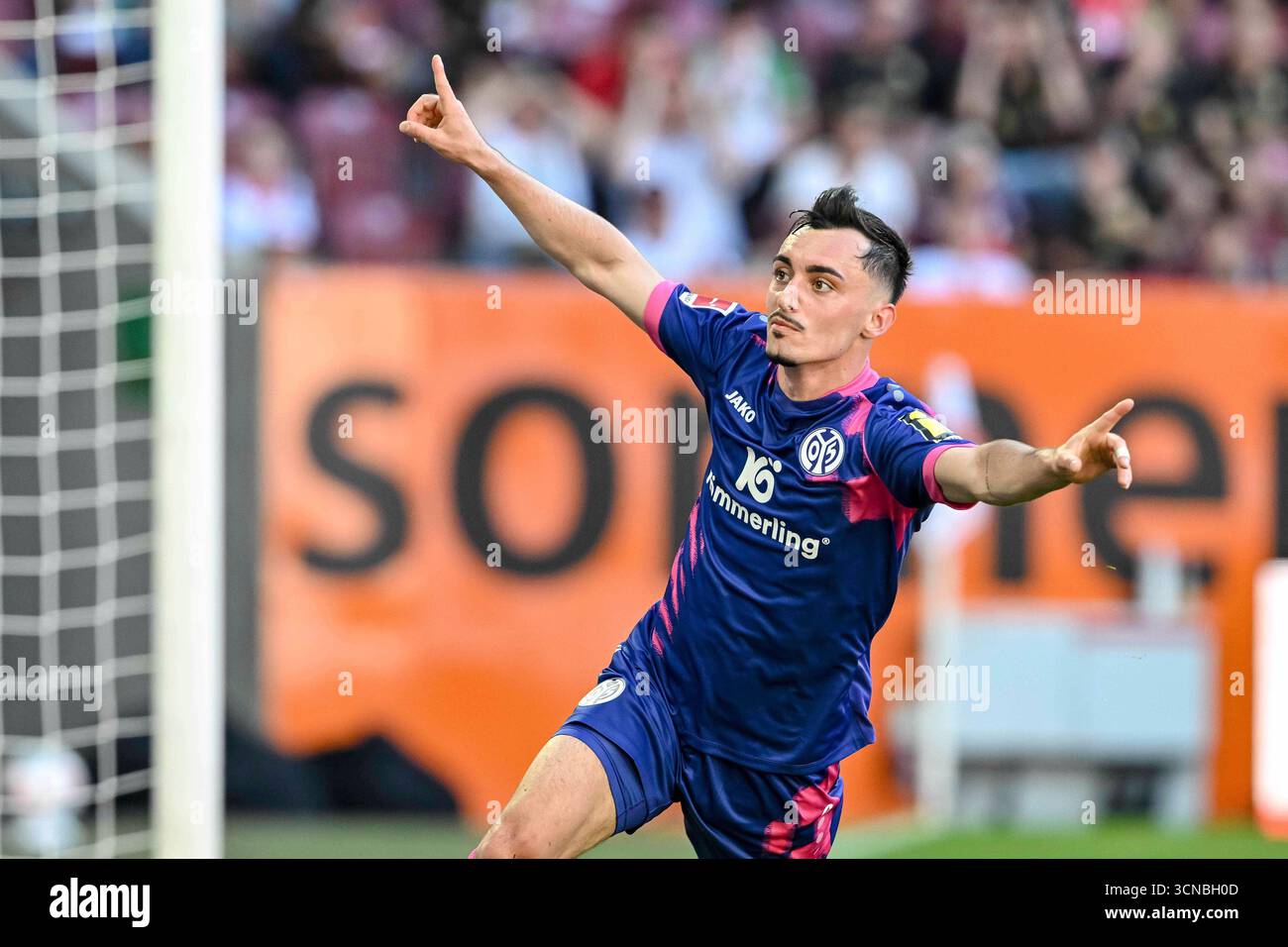 Mainz' Paul Nebel celebrates scoring during the Bundesliga soccer match ...