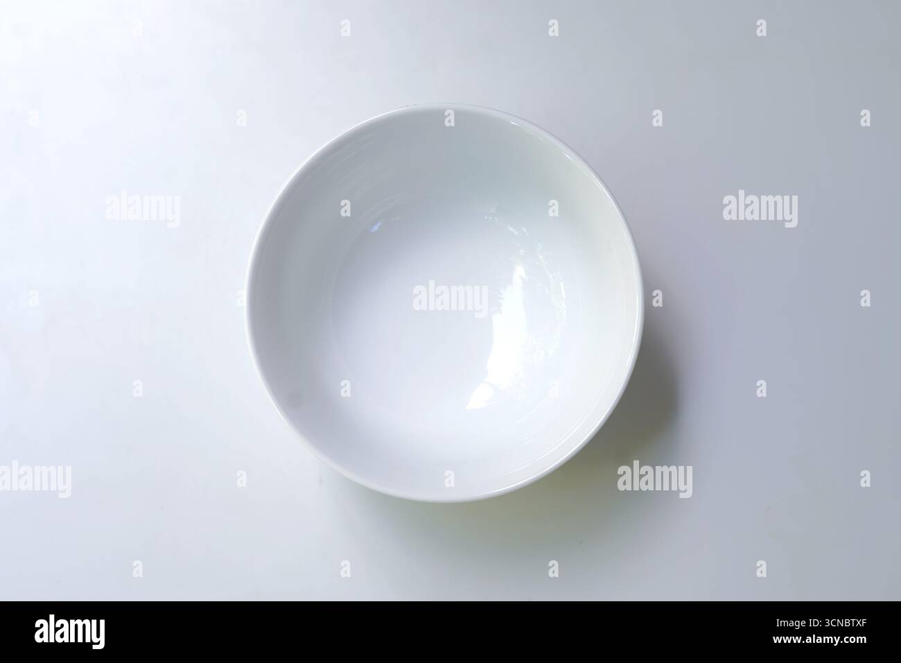 Empty white porcelain soup bowl image Stock Photo