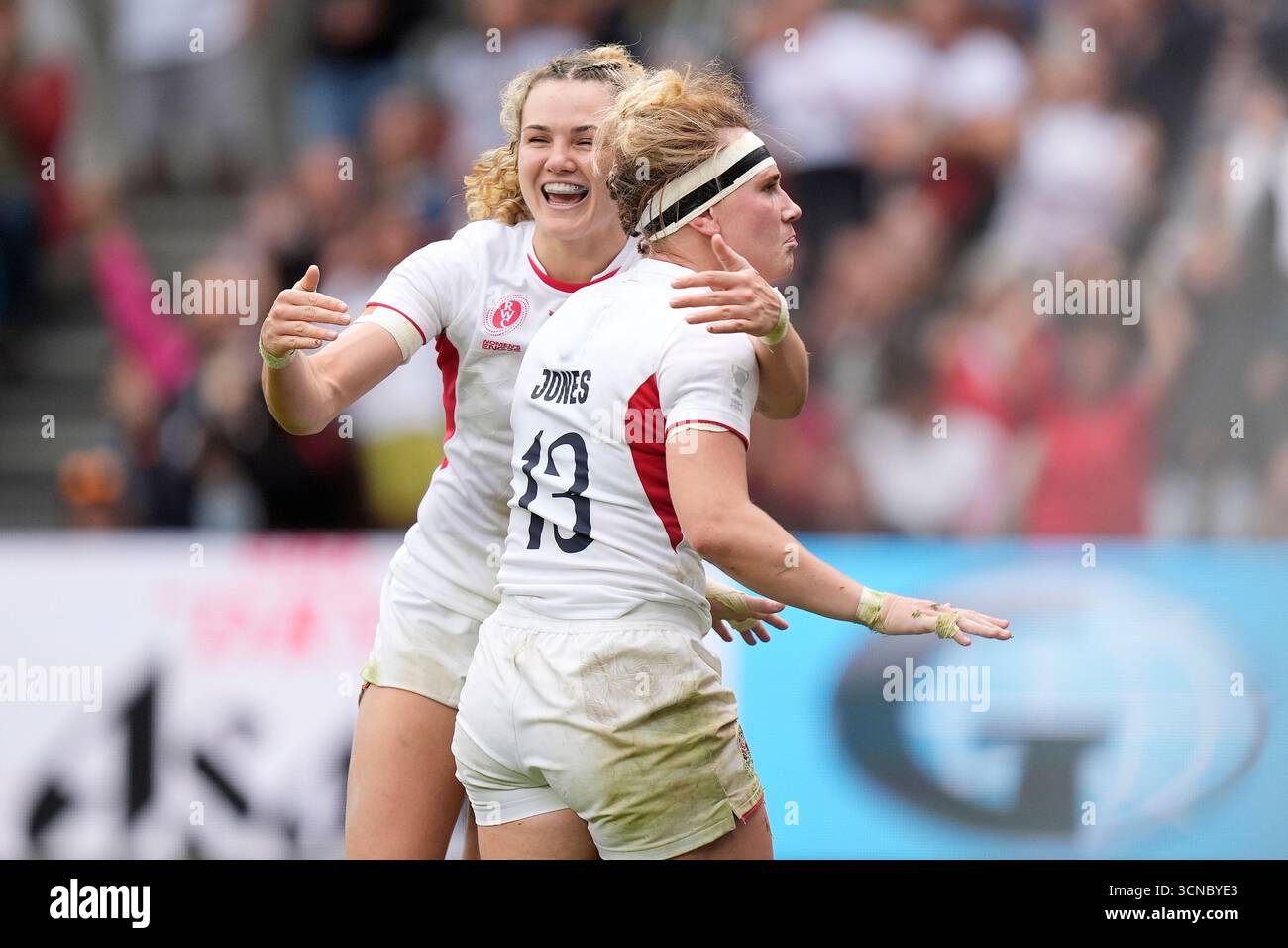 Meg Jones Rugby Partner England's Megan Jones (right) celebrates scoring a try during the Women ...