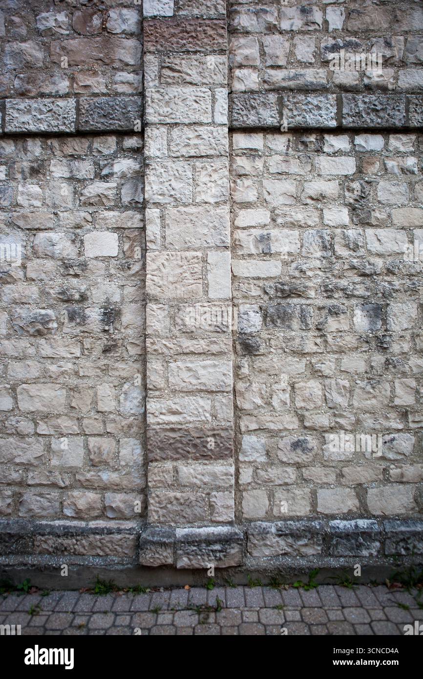 Grey brick wall embossed texture background Stock Photo