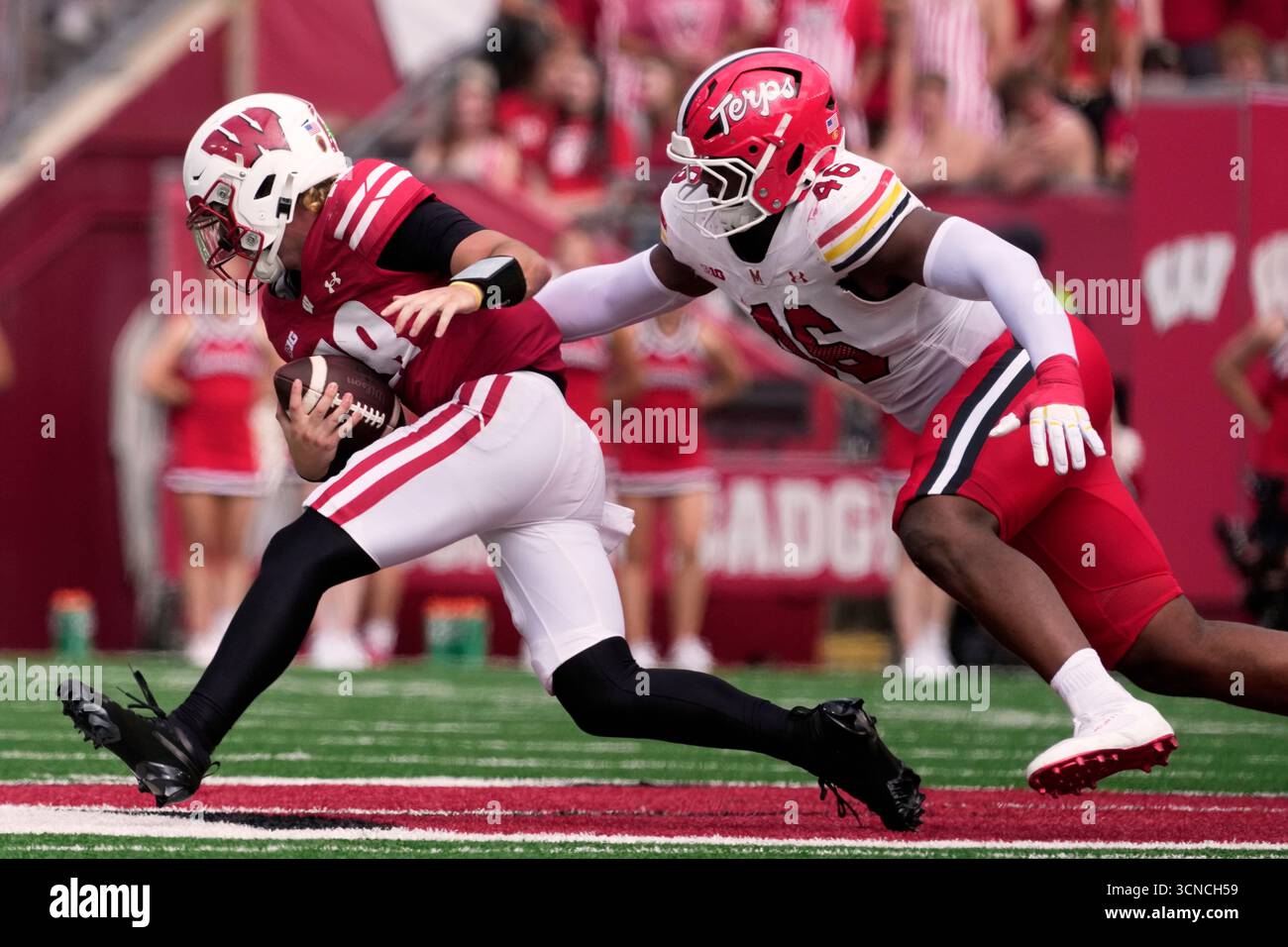 Maryland defensive lineman Dillan Fontus sacks Wisconsin quarterback