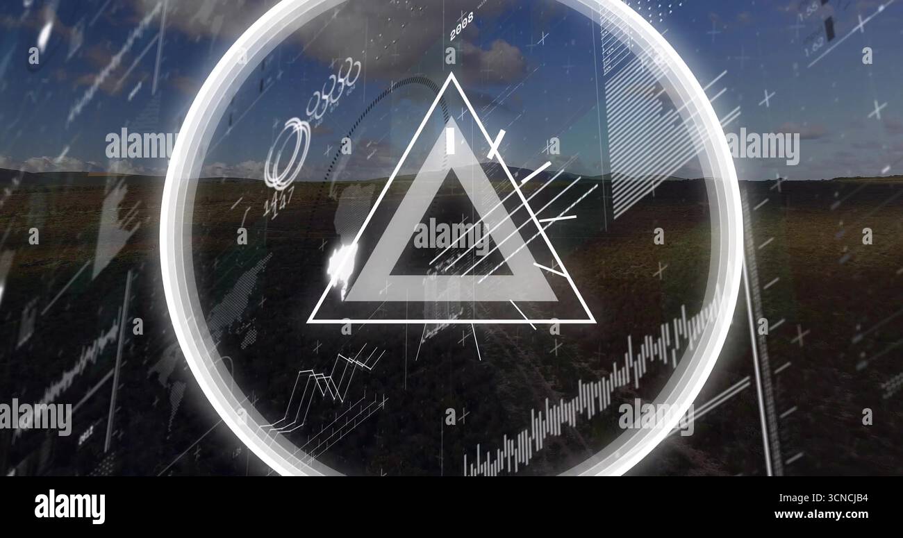 Displaying translucent HUD overlay over grassy plain, with glowing ring and triangular symbol Stock Photo