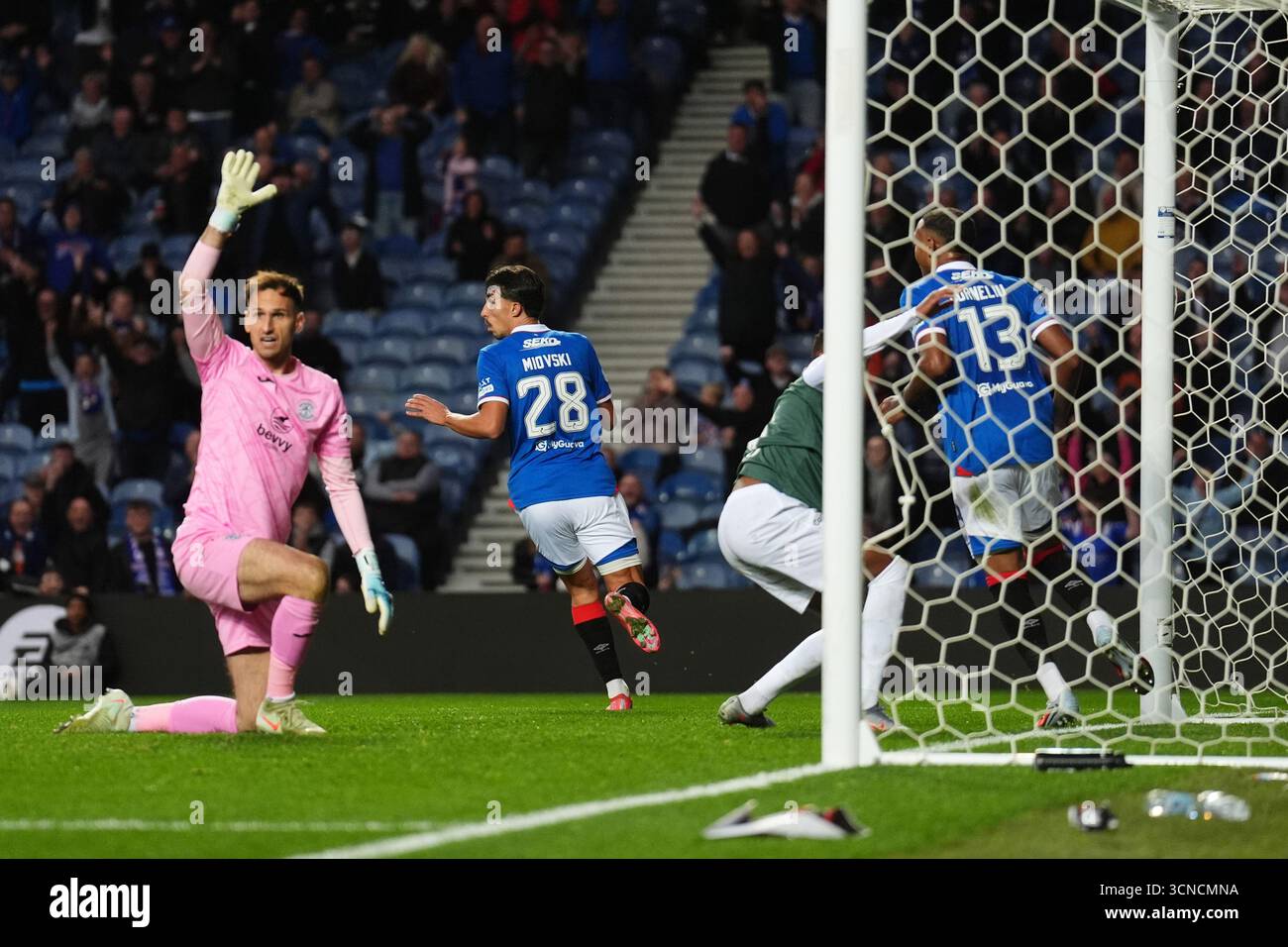 Rangers’ Bojan Miovski (second from left) after seeing a goal ...