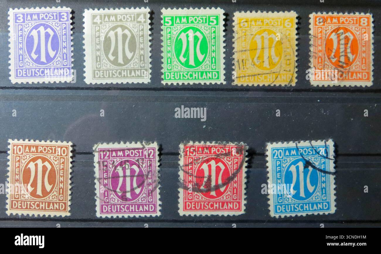 Lviv, Ukraine, March 12, 2016 A collection of vintage postage stamps from Germany classical designs reflecting various occupation administrations. Per Stock Photo