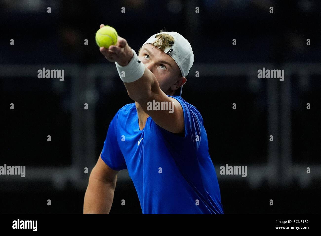 Team Europe's Holger Rune, of Denmark, serves against Team World's ...