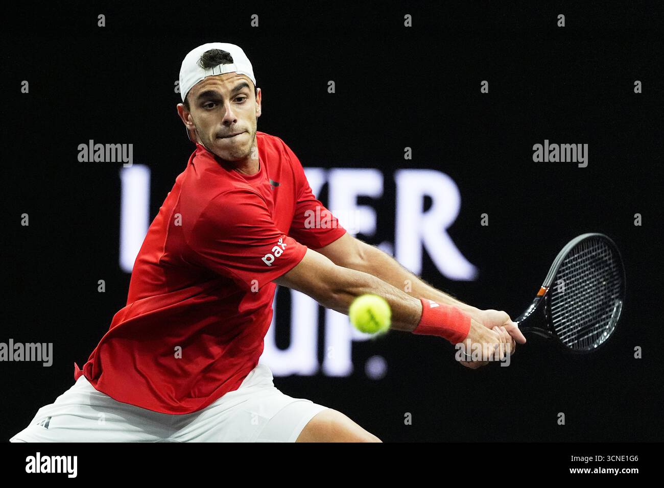 Team World's Francisco Cerundolo, of Argentina, returns a shot against ...