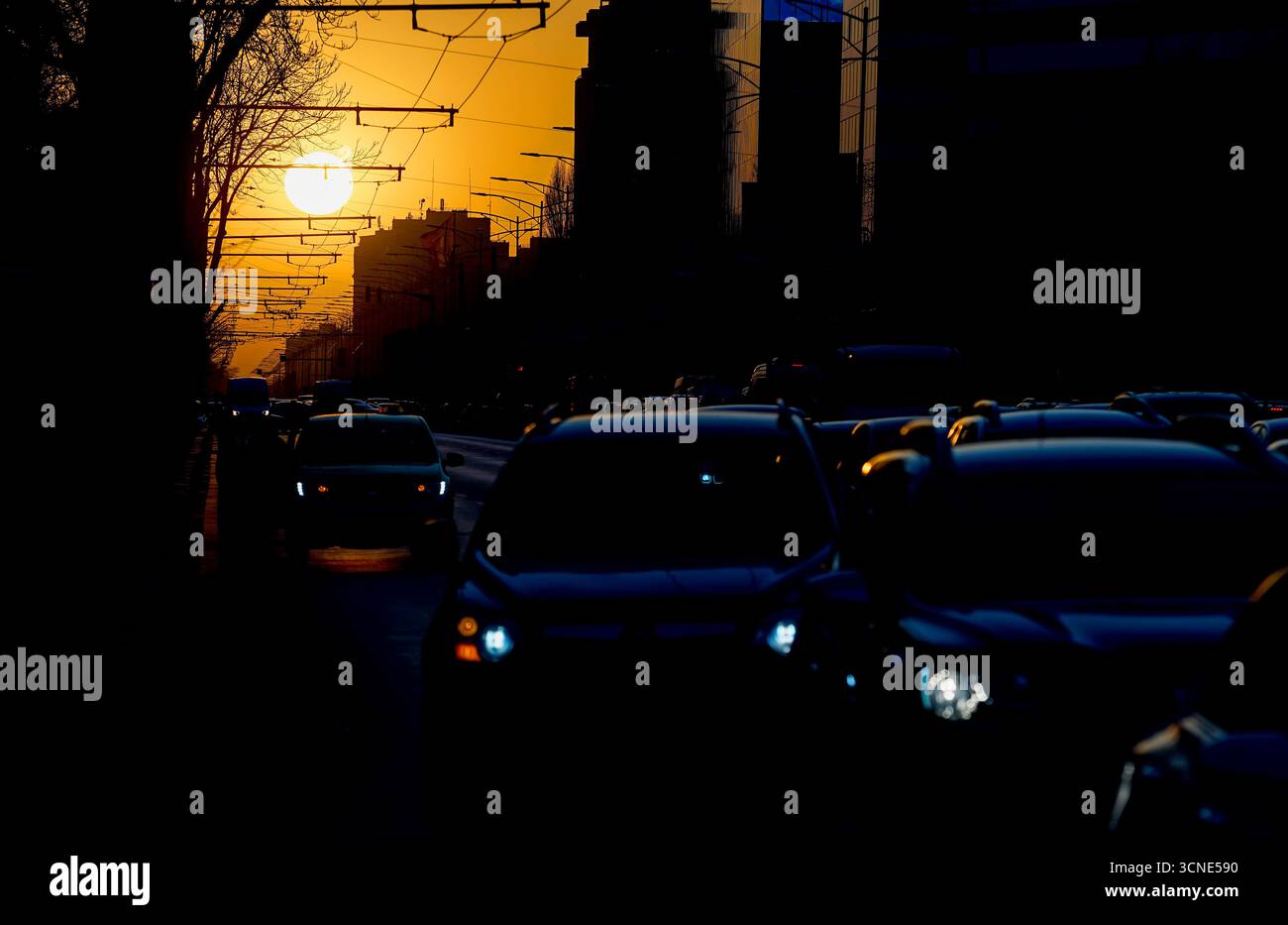Bucharest, Romania - March 22, 2022: Cars in traffic at rush hour on a boulevard in Bucharest. Stock Photo