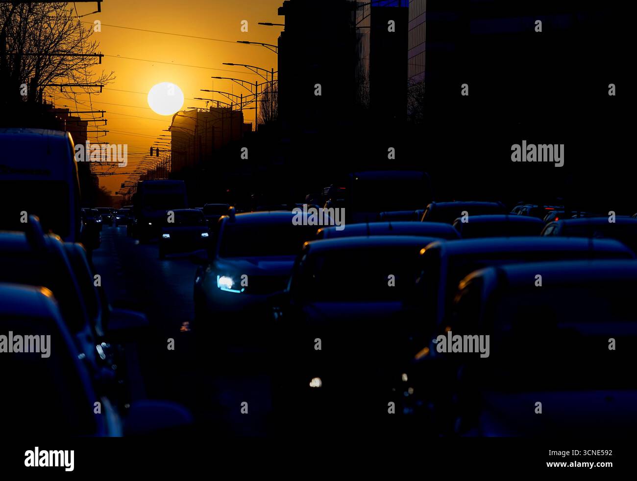 Bucharest, Romania - March 22, 2022: Cars in traffic at rush hour on a boulevard in Bucharest. Stock Photo