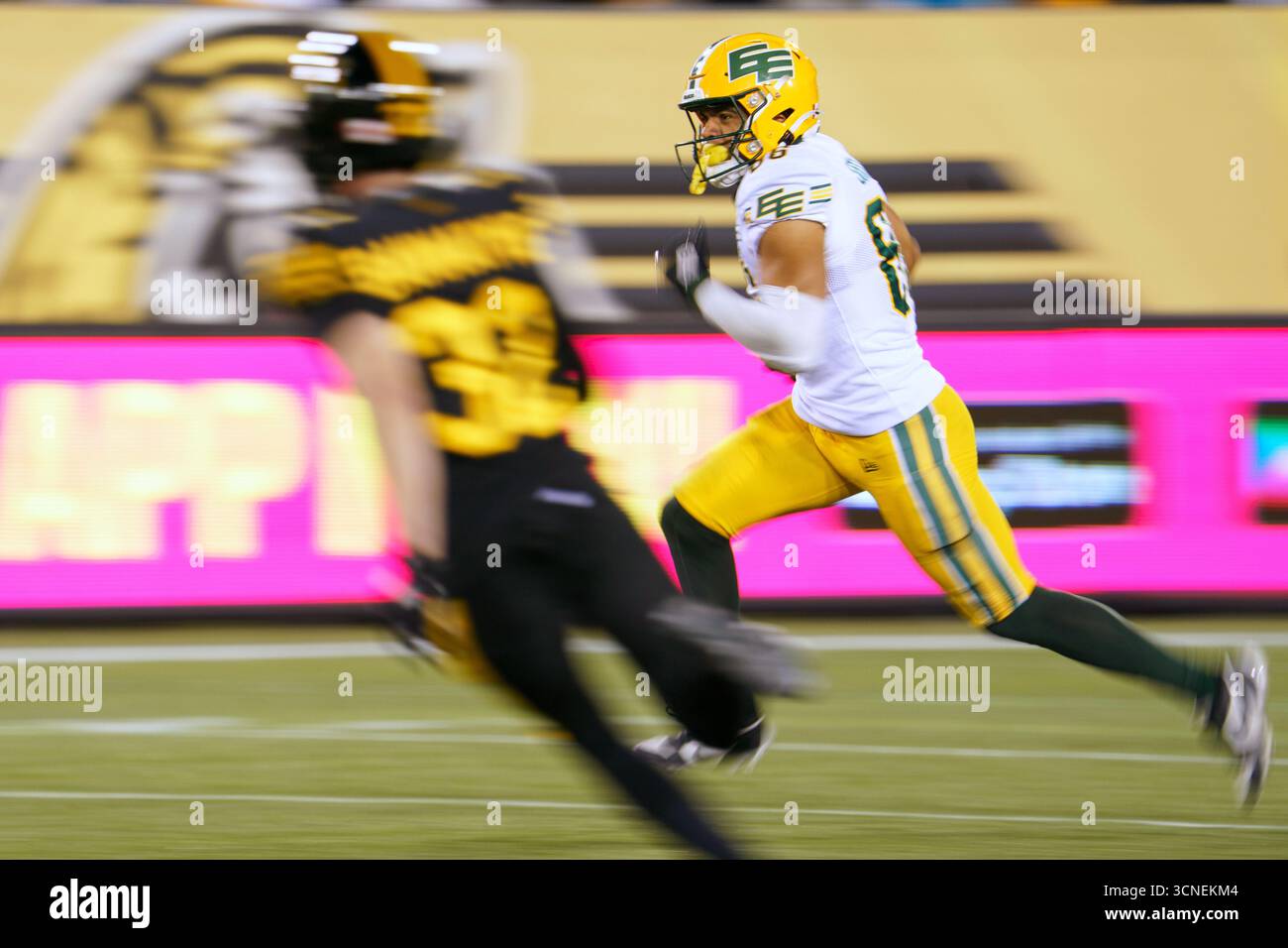 Arkell Smith Edmonton Elks wide receiver Arkell Smith (86) runs back a punt during a ...