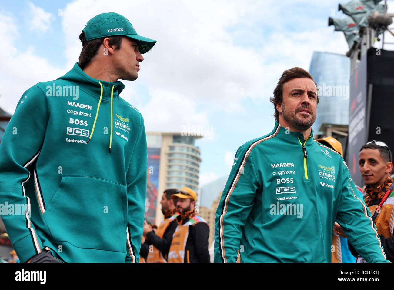 l-to-r-lance-stroll-cdn-aston-martin-f1-team-and-fernando-alonso