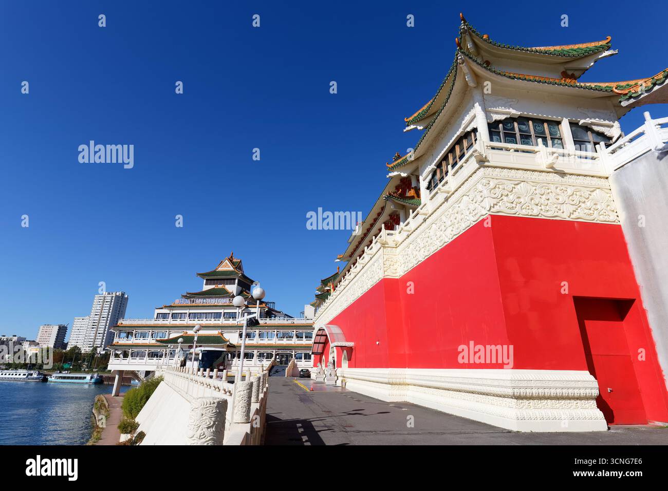 Alfortville, France - September 17 , 2025 : The view of the chinese-inspired architecture of the Huatian Chinagora hotel complex with curved roof corn Stock Photo