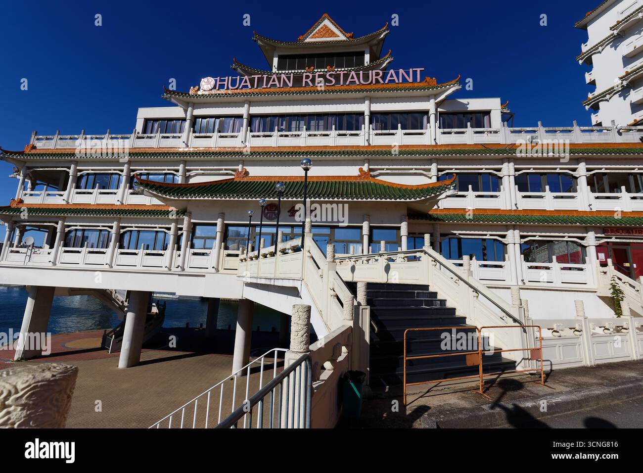 Alfortville, France - September 17 , 2025 : The view of the chinese-inspired architecture of the Huatian Chinagora restaurant complex with curved roof Stock Photo