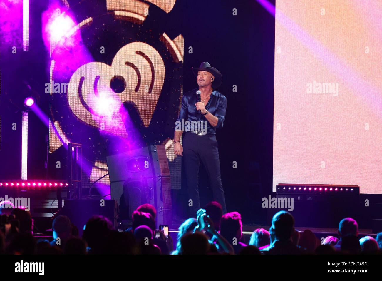 Tim McGraw performs on stage during the iHeartRadio Music Festival