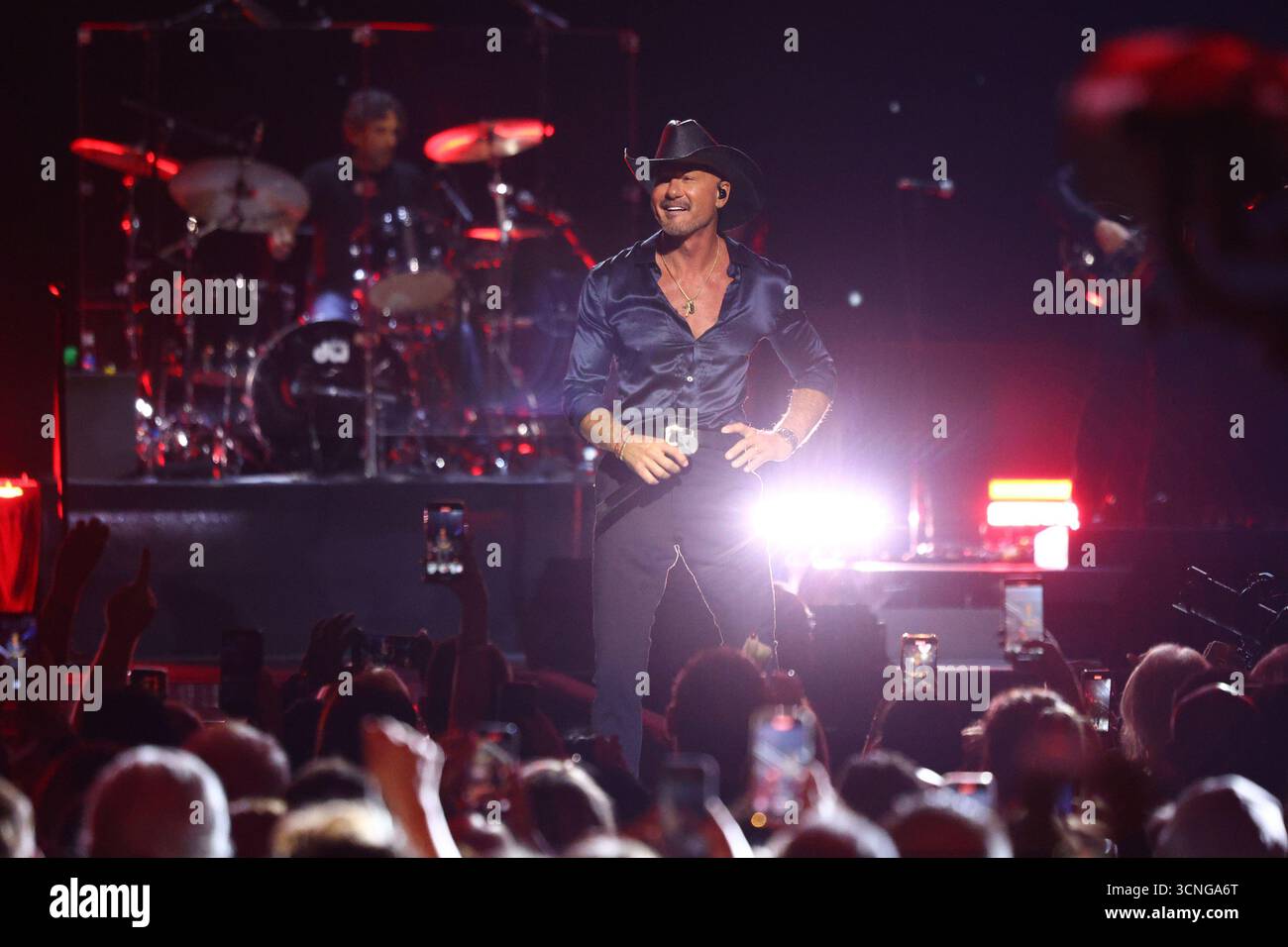 Tim McGraw performs on stage during the iHeartRadio Music Festival