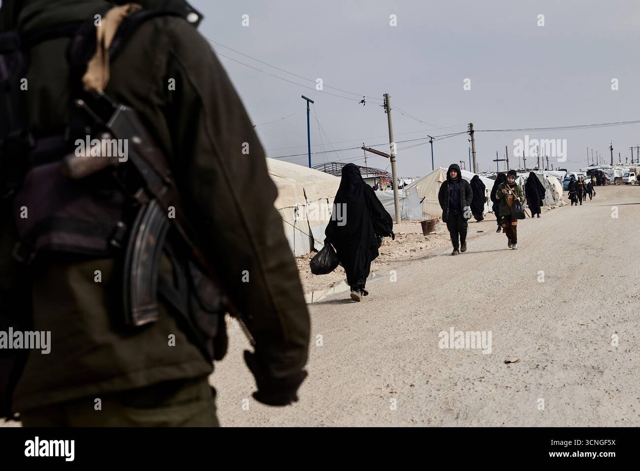 Al Hol, February 11, 2025 – A member of the Kurdish security forces ...